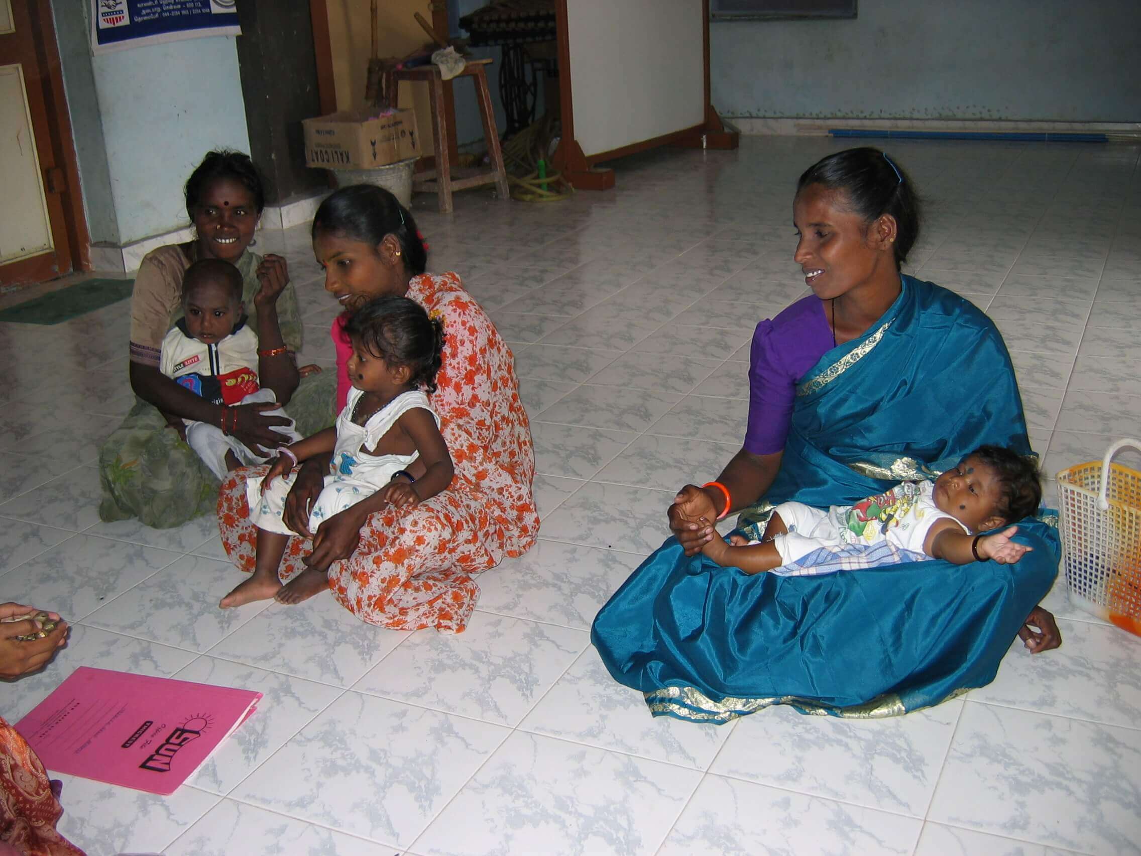 Mothers of toddler group meeting at Child Development Centre in Irumaram